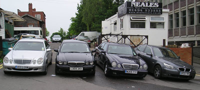 Neales taxis outside the office on Corporation Street